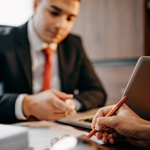 Person signing contract with solicitor as witness